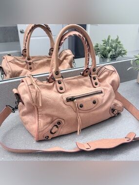 Balenciaga classic city biker bag in apricot-pink.